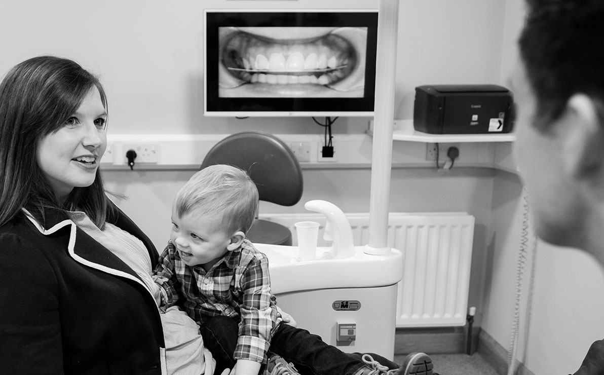 Woman consulting with the dentist about her final smile design