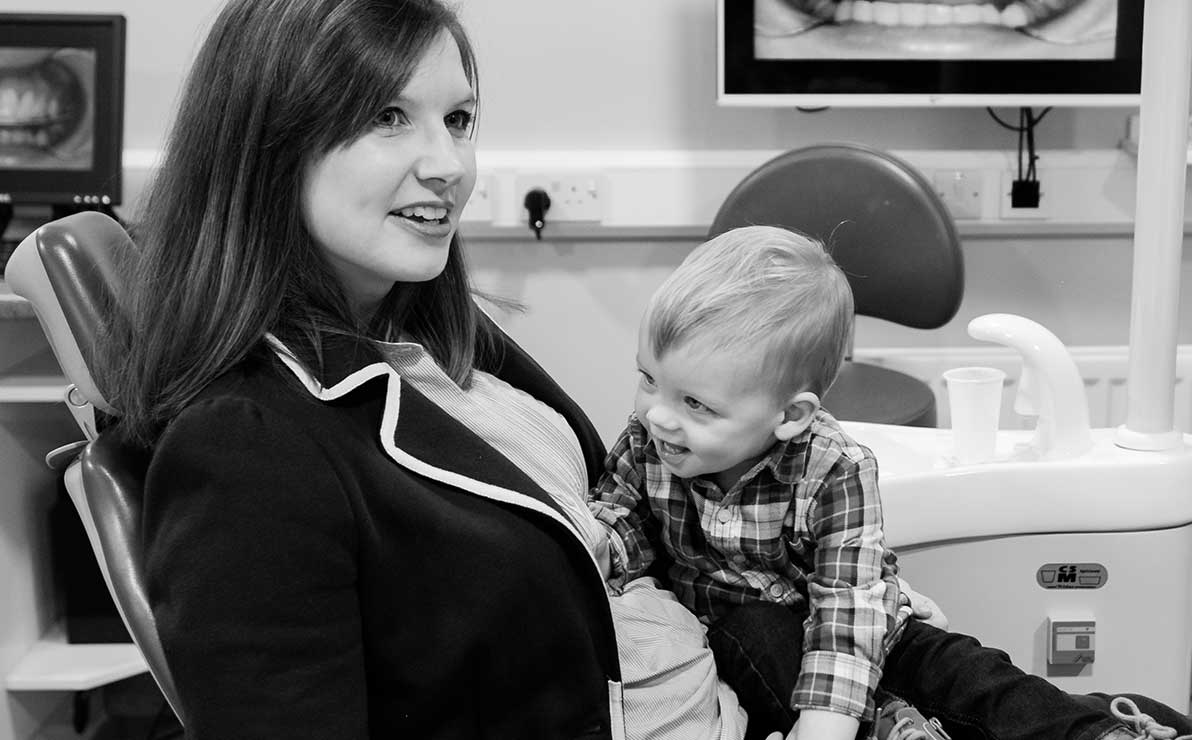 Toddler being introduced to the dental envirment.